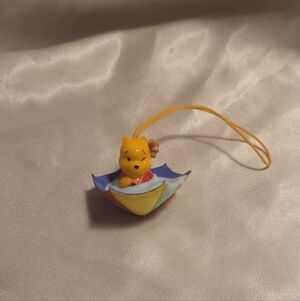 Disney Yellow Winnie the Pooh in Rainbow Umbrella Charm Peek A Pooh